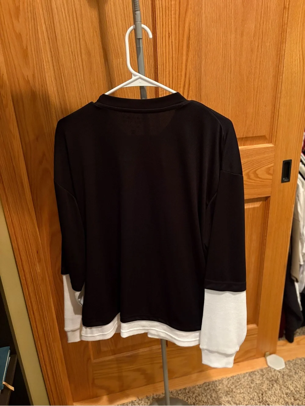 Black and White Layered-Look Long Sleeve Top with Pink Graphic